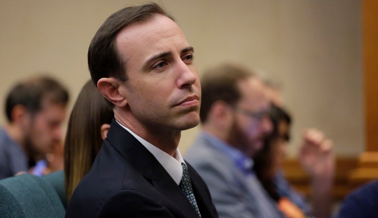 Secretary of State David Whitley, center, attends his confirmation hearing, Thursday, Feb. 7, 2019, in Austin, Texas, where he addressed the backlash surrounding Texas' efforts to find noncitizen voters on voter rolls.