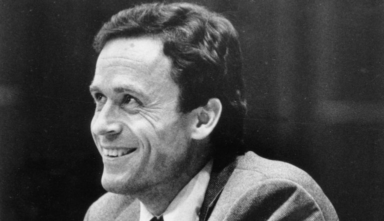 In this June 27, 1979 photo, Ted Bundy smiles during the second day of jury selection for his murder trial in a Dade County courtroom in Miami, Fla. on Jan. 15, 1978. 