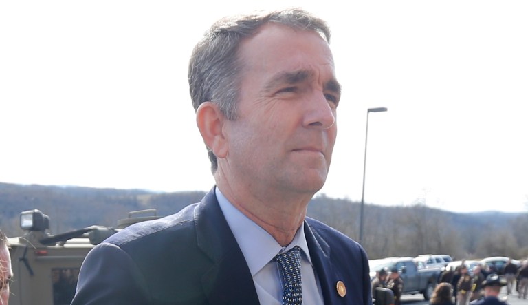 Virginia Gov. Ralph Northam, right, and his wife Pam, left, leave the funeral of fallen Virginia State Trooper Lucas B. Dowell after the church service for the funeral at the Chilhowie Christian Church in Chilhowie, Va., Saturday, Feb. 9, 2019. Dowell was killed in the line of duty earlier in the week.
