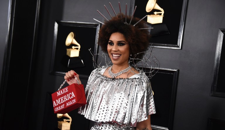Joy Villa holds a purse that reads "Make America Great Again" at the 61st annual Grammy Awards at the Staples Center on Sunday, Feb. 10, 2019, in Los Angeles.