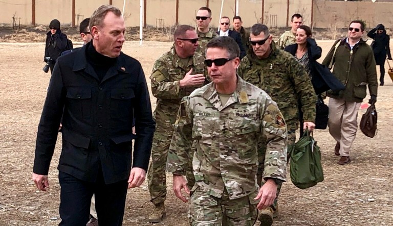 Acting Defense Secretary Pat Shanahan, left, arrives in Kabul, Afghanistan, Monday morning, Feb. 11, 2019, to consult with Army Gen. Scott Miller, right, commander of U.S. and coalition forces, and senior Afghan government leaders. 