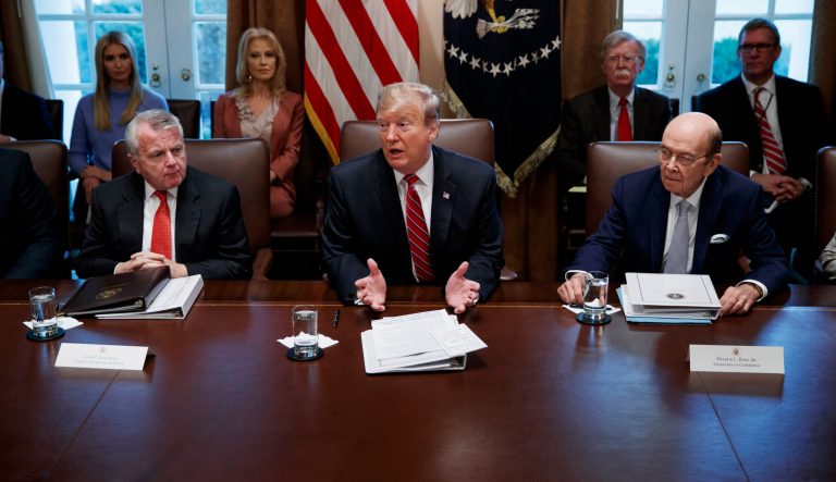 Deputy Secretary of State John Sullivan, left, and Commerce Secretary Wilbur Ross, right, listen as President Donald Trump speaks during a cabinet meeting at the White House, Tuesday, Feb. 12, 2019, in Washington. 
