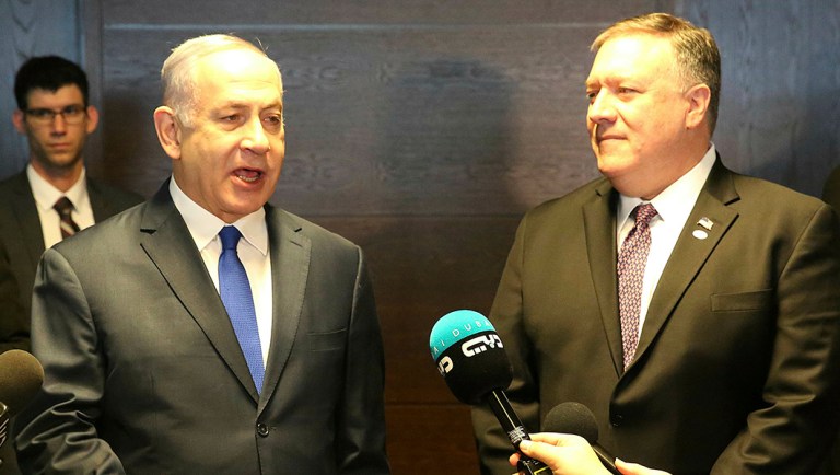 Israeli Prime Minister Benjamin Netanyahu, left, and Secretary of State Mike Pompeo, right, talk to the press.