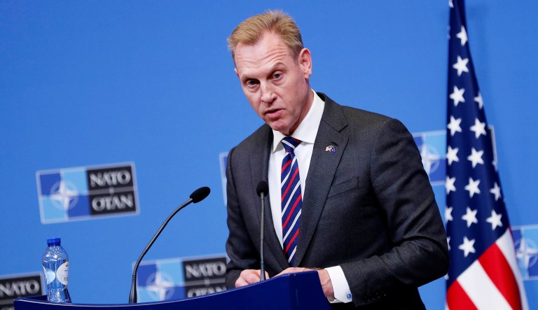 Acting Defense Secretary Patrick Shanahan talks to journalists during a press conference at the second day of a NATO defense ministers meeting at NATO headquarters in Brussels.