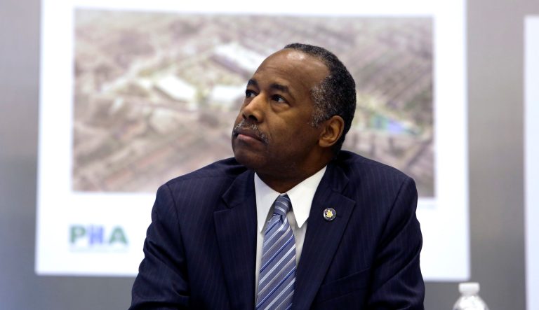 Housing and Urban Development Secretary Ben Carson watches a video presentation at the Philadelphia Housing Authority, Thursday Feb. 14, 2019 in Philadelphia. 