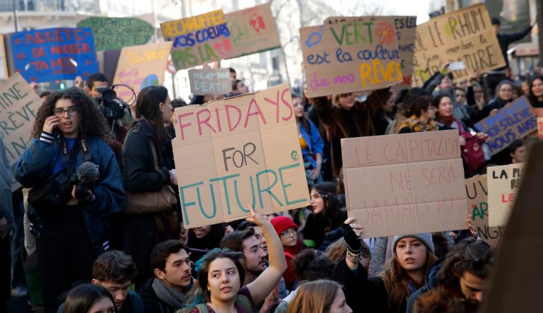 Students protest in front of the ecology ministry during a climate change protest in Paris, Friday, Feb. 15, 2019. The demonstration is one many nationwide to demand action against climate change. 