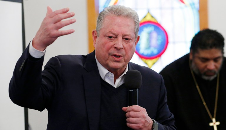 Former Vice President Al Gore speaks to a group of local residents during a meeting at the Grove Missionary Baptist Church in Buckingham, Va.