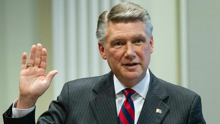 Mark Harris, Republican candidate in North Carolina's 9th Congressional race, prepares to testify.