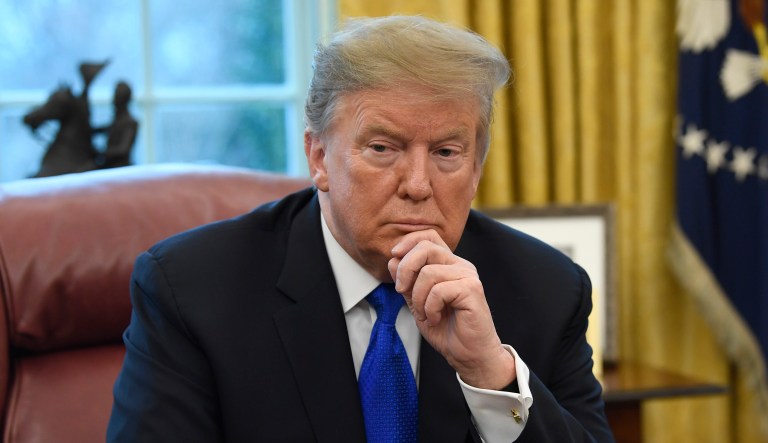 President Trump sits in his office.