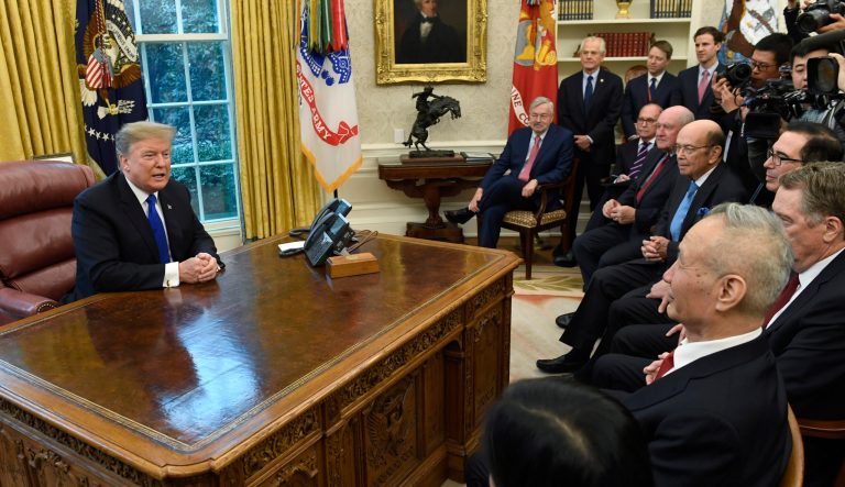 President Donald Trump, right, speaks during his meeting with Chinese Vice Premier Liu He, front right, in the Oval Office of the White House in Washington, Friday, Feb. 22, 2019. 