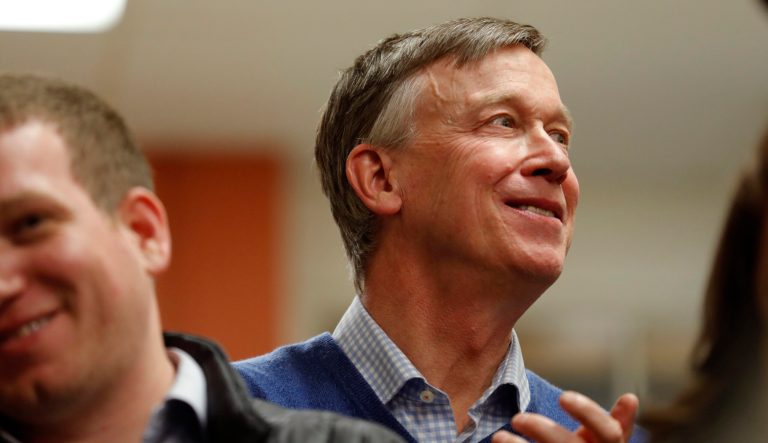 Former Colorado Gov. John Hickenlooper waits to speak at the Story County Democrats' annual soup supper fundraiser, Saturday, Feb. 23, 2019, in Ames, Iowa. 