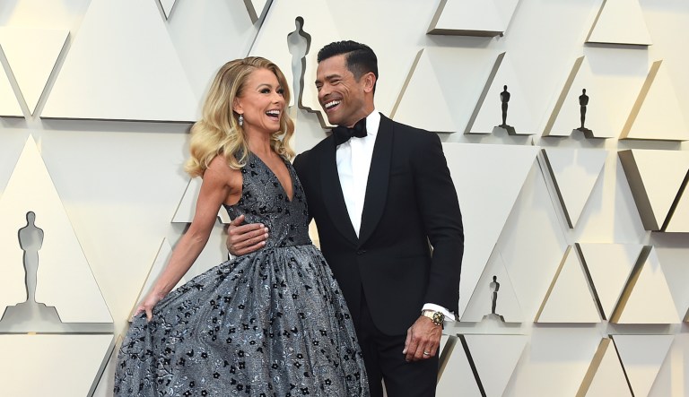 Kelly Ripa, left, and Mark Consuelos arrive at the Oscars on Sunday, Feb. 24, 2019, at the Dolby Theatre in Los Angeles.