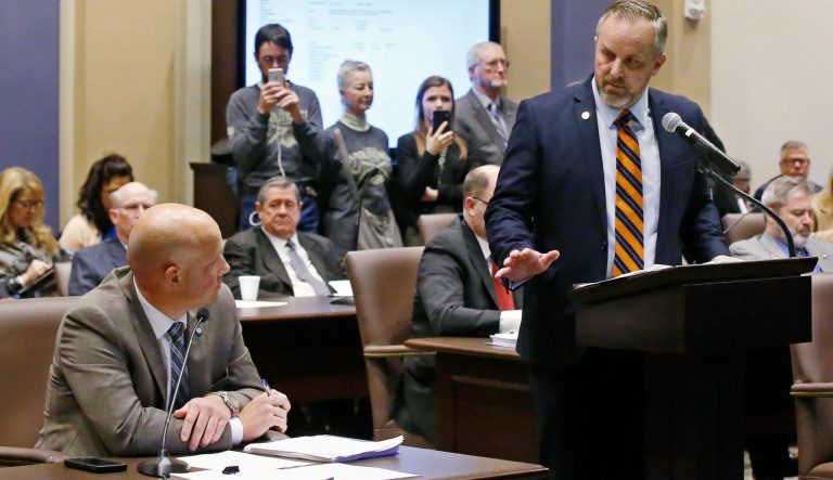 Oklahoma state Senator Joseph Silk, R-Broken Bow, left, debates with Oklahoma state Sen. Greg Treat, R- Oklahoma City, President Pro Tempore, right, on the best way to ban abortion in Oklahoma during a Senate committee meeting Monday, Feb. 25, 2019, in Oklahoma City. 
