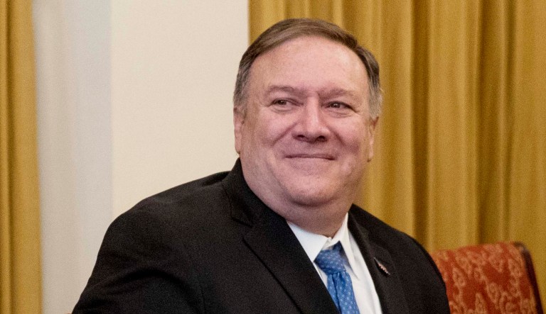 Secretary of State Mike Pompeo attends a meeting.
