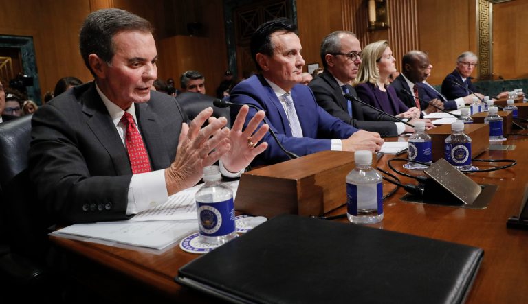Richard A. Gonzalez, far left, Chairman and Chief Executive Officer AbbVie Inc., testifying before the Senate Finance Committee hearing on drug prices, Tuesday, Feb. 26, 2019 on Capitol Hill in Washington. 