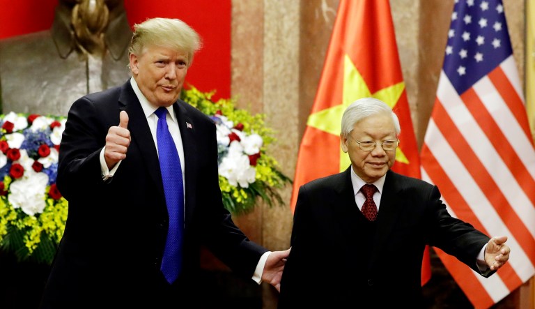 President Trump meets Vietnamese President Nguyen Phu Trong at the Presidential Palace in Hanoi.