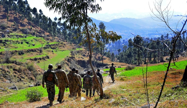 Pakistani soldiers patrol in the area where Indian planes launched a pre-dawn airstrike on Tuesday inside Pakistan that India said targeted a terrorist training camp, in Jaba, near Balakot, Pakistan.