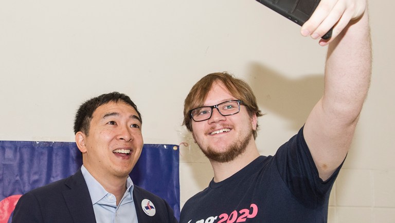 Andrew Yang, a candidate in the Democratic primaries for president, has a selfie taken.