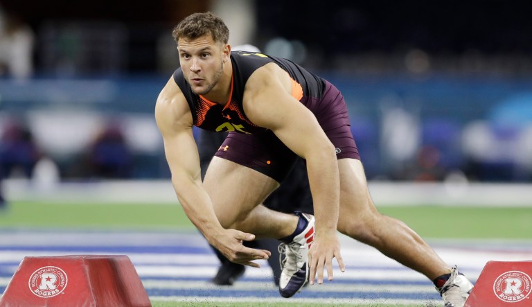 Ohio State defensive lineman Nick Bosa runs a drill during the NFL football scouting combine.