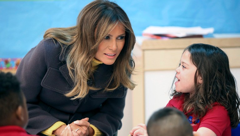 First Lady Melania Trump talks with Precious Smith, a Pre-K student, during a visit to Dove School of Discovery in Tulsa.