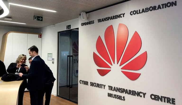 Journalists visit the new cybersecurity center of Chinese tech company Huawei, in Brussels.