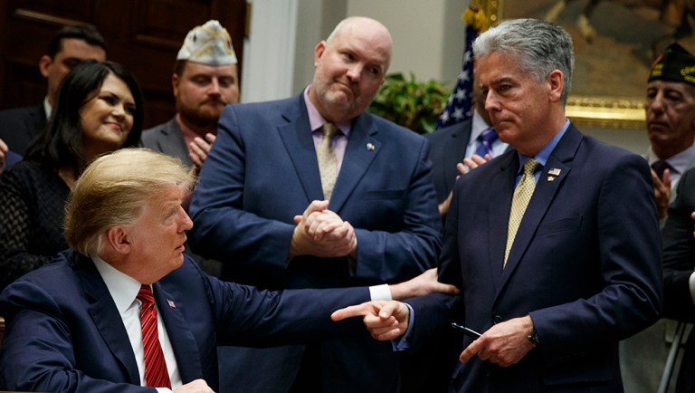 President Trump talks with former Navy SEAL, and Sergeant at Arms of the United States Senate Frank Larkin.