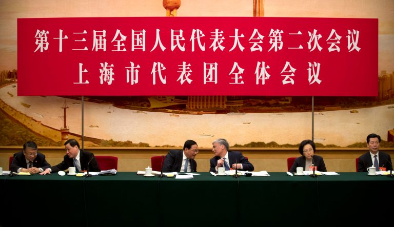 Li Qiang, Communist Party secretary of Shanghai, third from left, and other leaders of the Shanghai delegation talk during a group discussion session held on the sidelines of the annual meeting of China's National People's Congress (NPC) in the Shanghai Hall of the Great Hall of the People in Beijing, Wednesday, March 6, 2019.