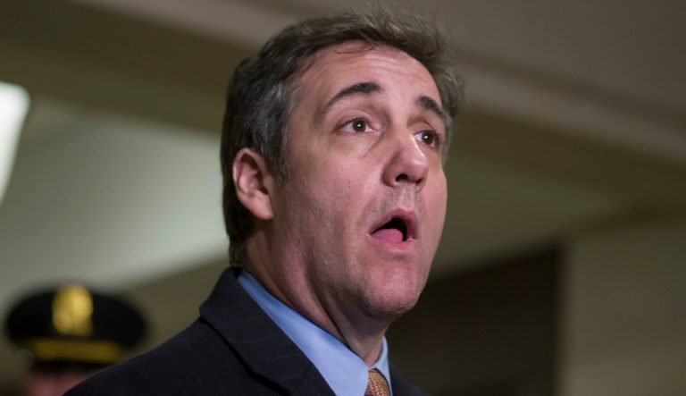 Michael Cohen, President Donald Trump's former lawyer, speaks as he departs after testifying before a closed-door session of the House Intelligence Committee on Capitol Hill, Wednesday, March 6, 2019, in Washington. 