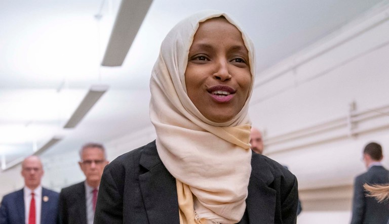 Rep. Ilhan Omar, D-Minn., walks to the chamber Thursday, March 7, 2019, on Capitol Hill in D.C.