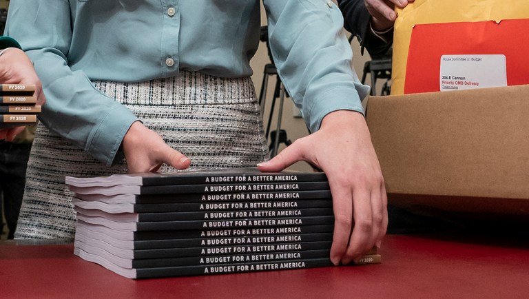 Office of Management and Budget staff delivers President Trump's 2020 budget outline.