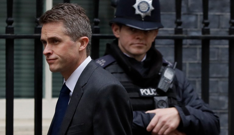 Defense Secretary Gavin Williamson arrives for a cabinet meeting at Downing Street in London, Tuesday, March 12, 2019.