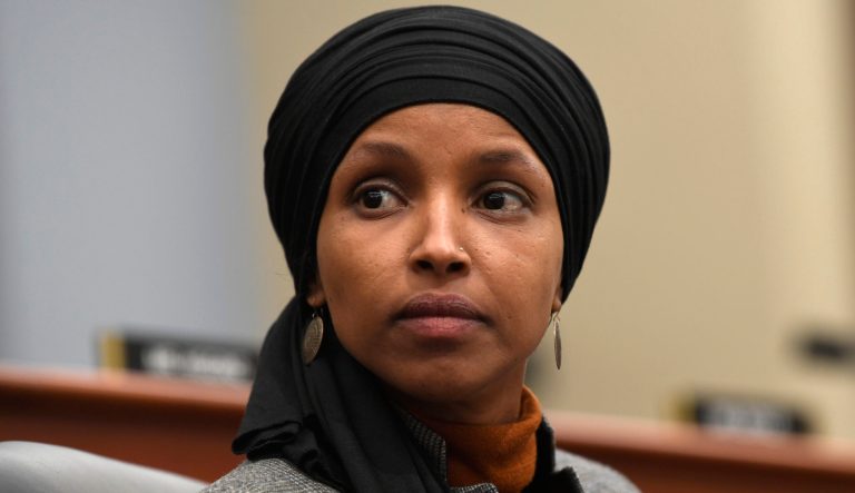 Rep. Ilhan Omar, D-Minn., listens during a meeting of the House Budget Committee on Capitol Hill in Washington, Tuesday, March 12, 2019.