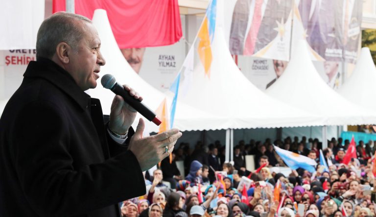Turkey's President Recep Tayyip Erdogan addresses the supporters of his ruling Justice and Development Party, AKP, during a rally in Ankara, Turkey, Wednesday, March 13, 2019. Erdogan has laid in to Israeli Prime Minister Benjamin Netanyahu, calling him a "thief" and a "tyrant" in the latest spat between the two leaders.