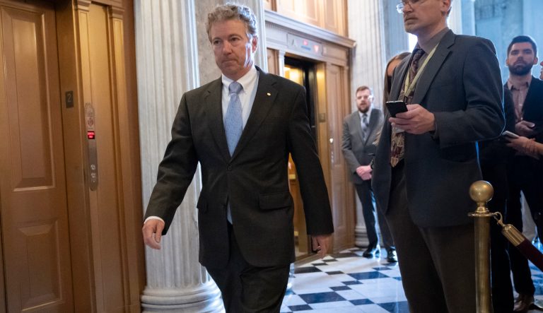 Sen. Rand Paul, R-Ky., walks to the Senate as an 11th-hour Republican rescue mission to keep President Donald Trump from a Senate defeat on his signature issue of building barriers along the southwest border seems near collapse, at the Capitol in Washington, Wednesday, March 13, 2019. 