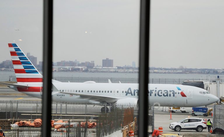 An American Airlines Boeing 737 MAX 8  plane sits at a boarding gate at LaGuardia Airport Wednesday, March 13, 2019, in New York.
