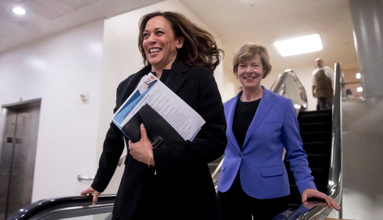 Sen. Kamala Harris, D-Calif., left, and Sen. Tammy Baldwin, D-Wis., right, leave the U.S. Capitol Building on Capitol Hill in Washington, Thursday, March 14, 2019. 