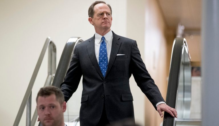 Sen. Patrick Toomey, R-Pa., leaves the U.S. Capitol building through the Senate Subway on Capitol Hill in Washington, Thursday, March 14, 2019.