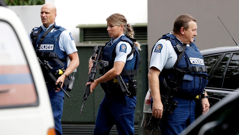 Armed police patrol outside a mosque in central Christchurch, New Zealand.