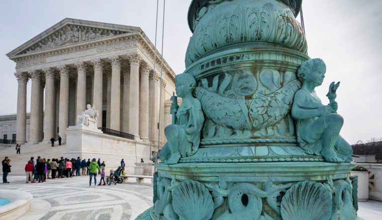 People line up to enter the Supreme Court in Washington, Wednesday, March 20, 2019. 
