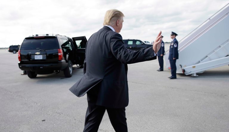 President Donald Trump walks to board Air Force One, after talking to the media, Sunday, March 24, 2019, at Palm Beach International Airport, in West Palm Beach, Fla., en route to Washington. 