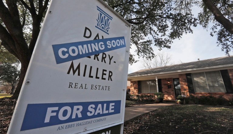 Mortgage demand fell last week as mortgage rates rose. FILE- In this Feb. 20, 2019, file photo a coming soon for sale sign sits in front of a home in the Dallas suburb of Richardson, Texas. On Tuesday, March 26, the Standard & Poor's/Case-Shiller 20-city home price index for January is released.