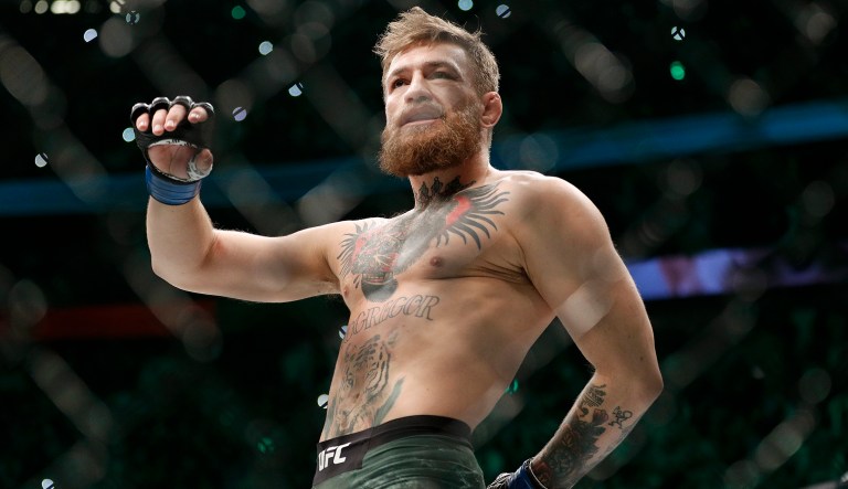FILE - In this Oct. 6, 2018, file photo, Conor McGregor walks in the cage before fighting Khabib Nurmagomedov in a lightweight title mixed martial arts bout at UFC 229 in Las Vegas.  Superstar UFC fighter McGregor has announced on social media that he is retiring from mixed martial arts. McGregorâs verified Twitter account had a post early Tuesday, March 26, 2019,  that said the former featherweight and lightweight UFC champion was making a âquick announcement.â 