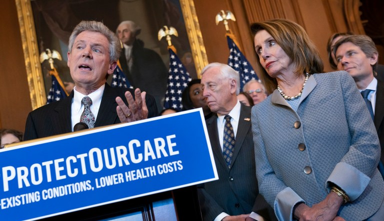 Speaker of the House Nancy Pelosi, D-Calif., joined at left by Energy and Commerce Committee Chair Frank Pallone, D-N.J., leads an event to announce legislation to lower health care costs and protect people with pre-existing medical conditions, at the Capitol in Washington, D.C.