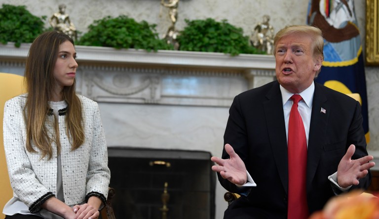 President Donald Trump, right, speaks during a meeting with Fabiana Rosales, left, a Venezuelan activist who is the wife of Venezuelan opposition leader Juan Guaido, in the Oval Office of the White House in Washington, Wednesday, March 27, 2019.