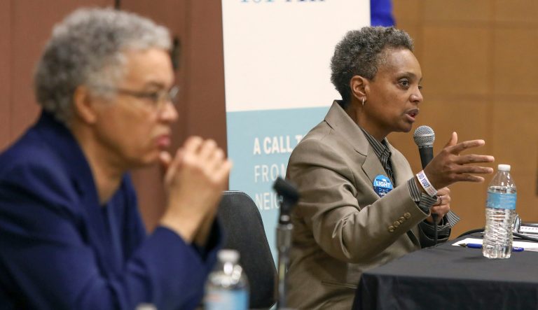 In this March 24, 2019 photo, Chicago mayoral candidate Lori Lightfoot, right, participates in a candidate forum in Chicago. Lightfoot and Toni Preckwinkle, left, are competing to make history by becoming the city's first black, female mayor. 