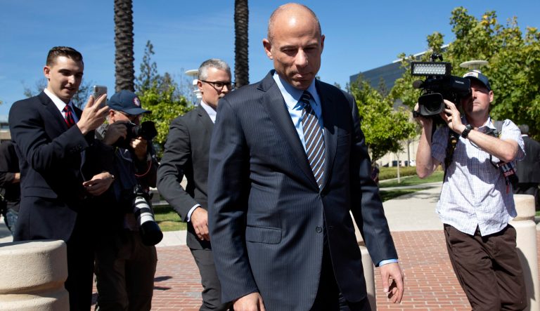 Attorney Michael Avenatti leaves federal court after a hearing, Monday, April 1, 2019, in Santa Ana, Calif. Avenatti appeared in federal court on charges he fraudulently obtained $4 million in bank loans and pocketed $1.6 million that belonged to a client. 