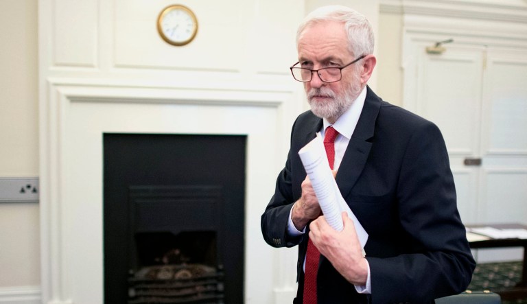 Britain's Labour leader Jeremy Corbyn walks around his office in the Houses of Parliament in London.