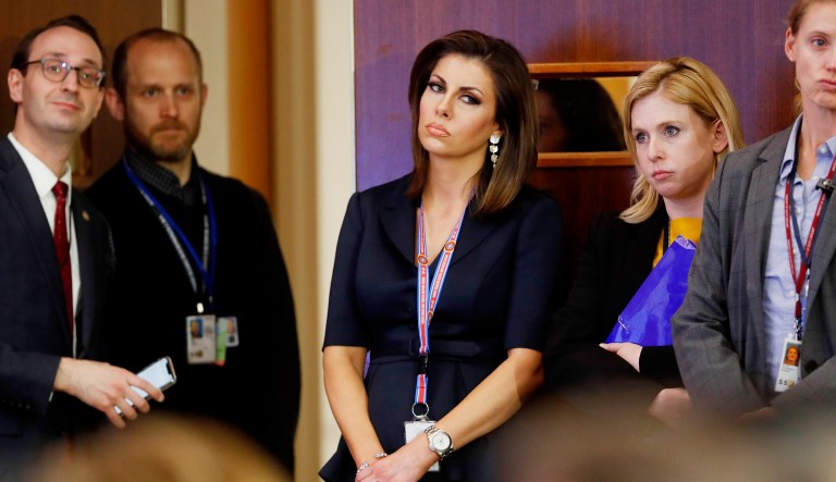 New State Department spokeswoman and former Fox News contributor Morgan Ortagus, center, watches as Secretary of State Mike Pompeo answers questions during a news conference at the U.S. State Department in Washington, Thursday, April 4, 2019.