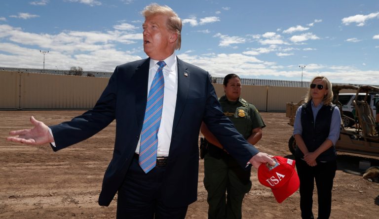 President Trump visits a new section of the border wall with Mexico in Calexico, Calif.