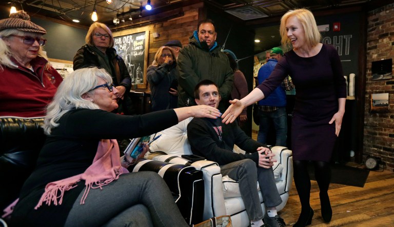 Democratic presidential candidate Sen. Kirsten Gillibrand, D-N.Y., shakes hands during a campaign stop.